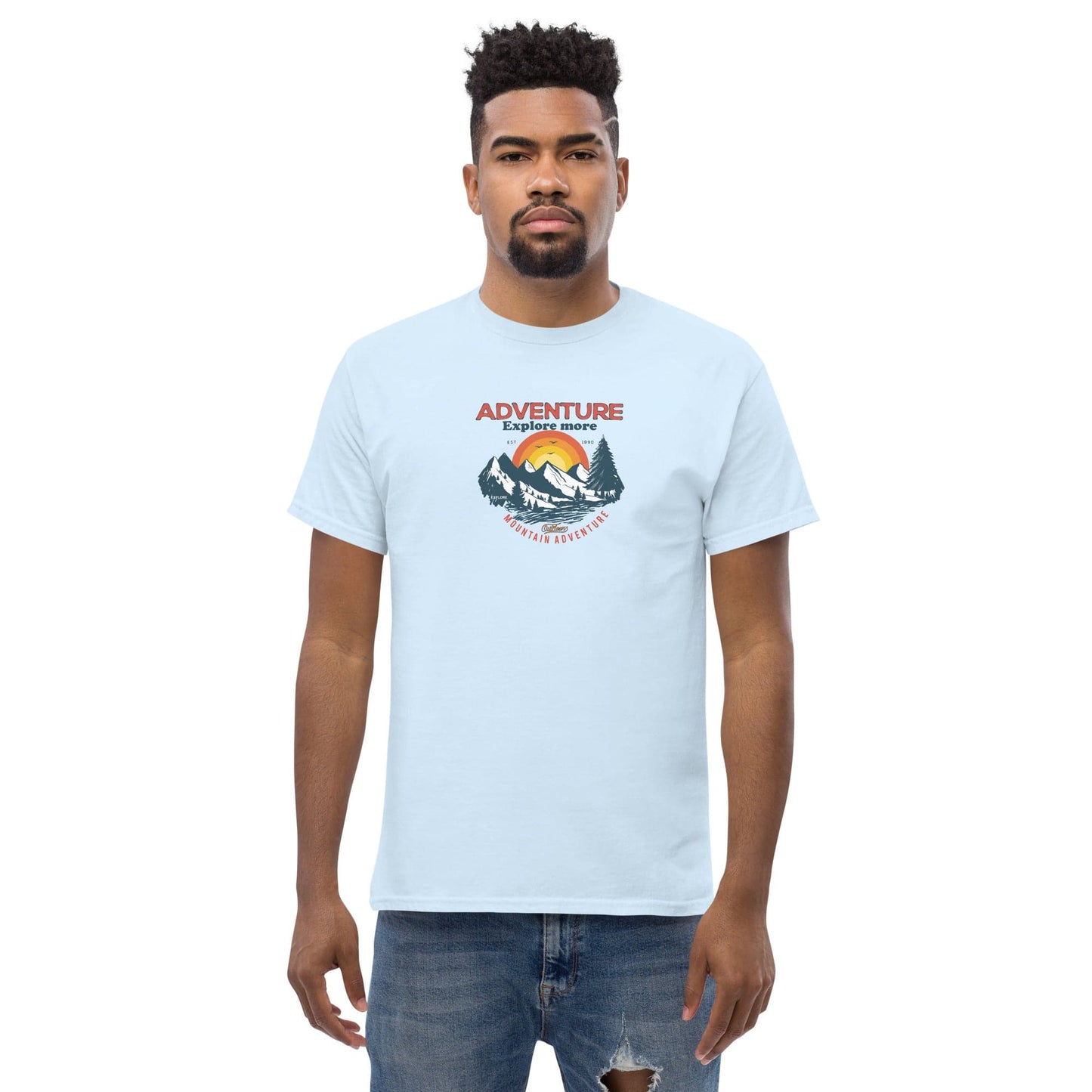 Light blue t-shirt with mountain graphic.