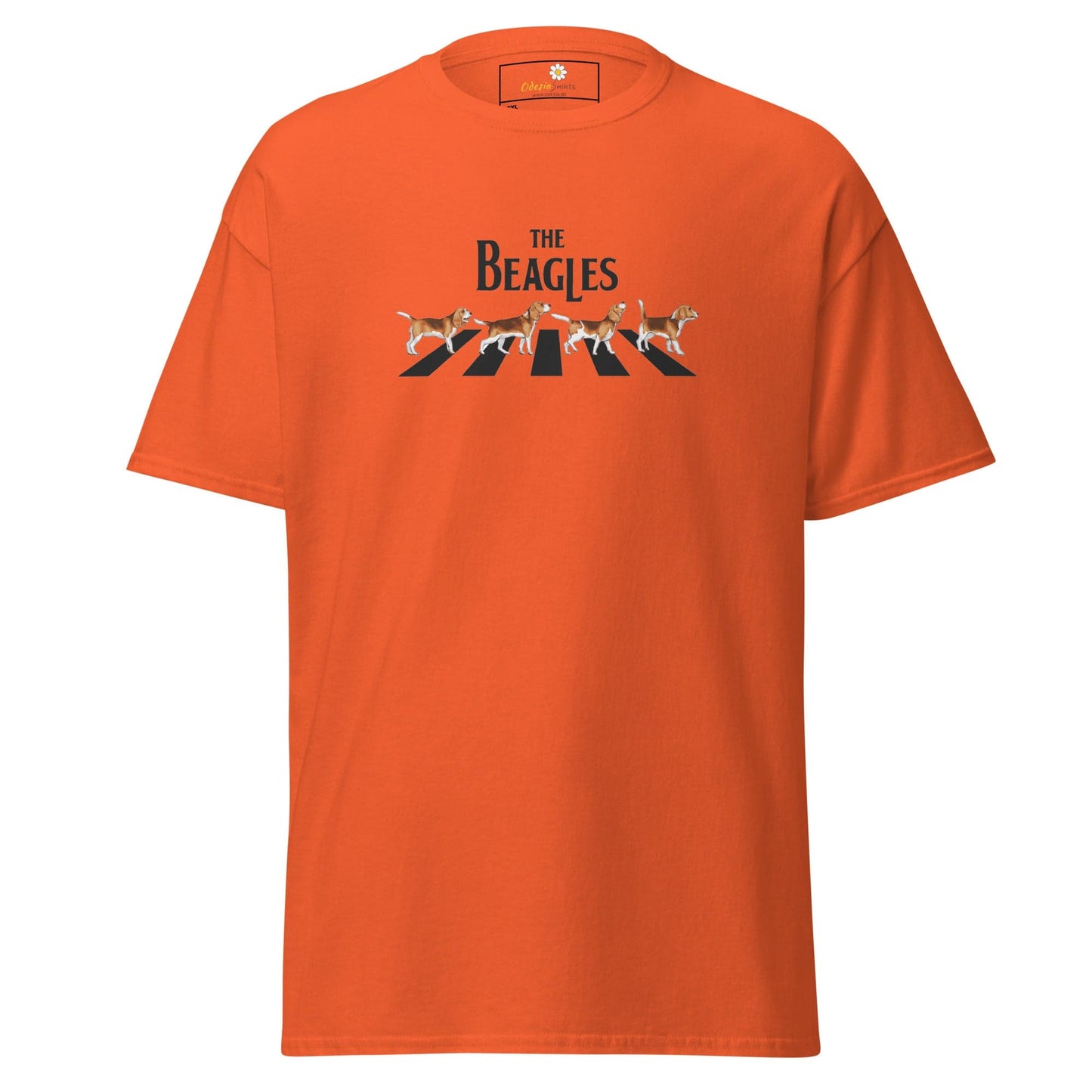 Orange t-shirt with ’The Beagles’ graphic.